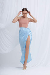 Silk draped maxi skirt with high slit and gathered wrap detail at the waist